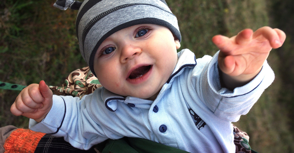 Baby Outside Reaching Toward Viewer baby outside reaching toward viewer